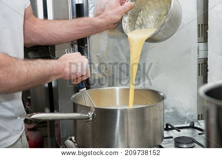 a pastry cook prepares the pastry close up