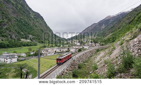 Brusio Switzerland - May 2017: Circular viaduct bridge near Brusio on the Swiss Alps