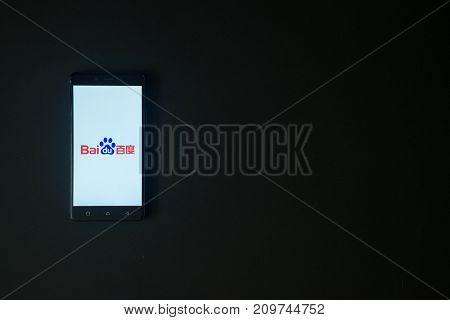 Los Angeles, USA, october 19, 2017: Baidu logo on smartphone screen on black background.