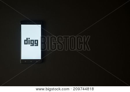 Los Angeles, USA, october 19, 2017: Digg logo on smartphone screen on black background.