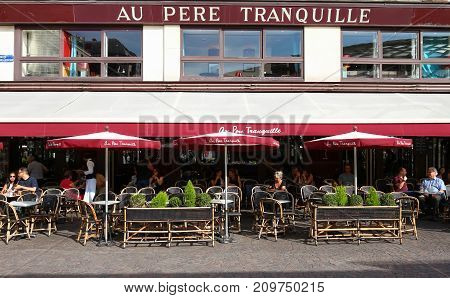 Paris, France-August 23, 2017 : The famous traditional French restaurant Au pere tranquille located Les Halles quarter at 16 rue Pierre Lescot in Paris.