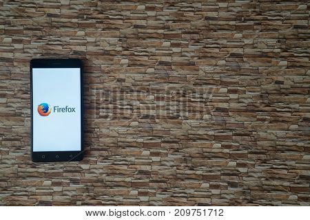 Los Angeles, USA, october 19, 2017: Mozilla firefox logo on smartphone screen on stone facing background