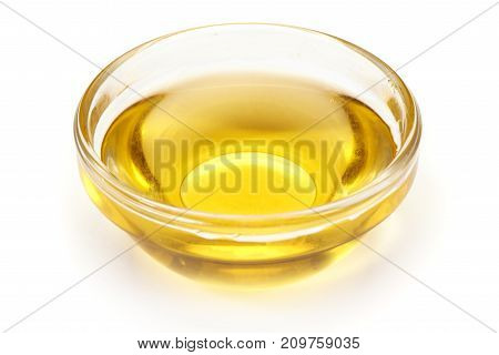 Cooking Vegetable Oil In A Small, Glass Cup, Isolated On White Background