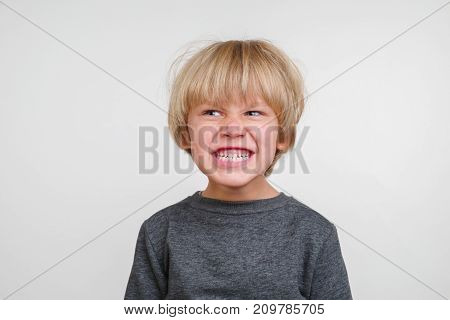 New horisontal emotional portrait of caucasian boy