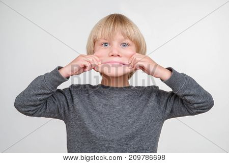 New horisontal portrait of handsome happy caucasian child