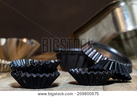 Old Baking Molds On An Old Kitchen Table. Baking Accessories In The Kitchen.