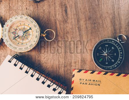 Vintage compass on the very old paper or letter envolop