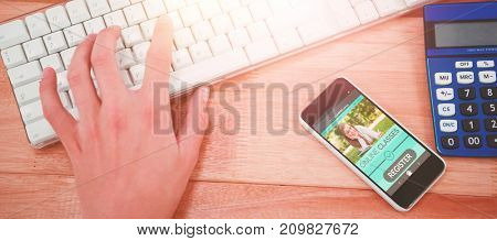 Digitally generated 3D image of e-learning interface on screen against man typing on keyboard at desk in office