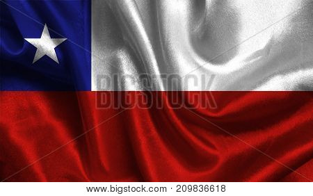 Realistic flag of Chile on the wavy surface of fabric. This flag can be used in design.