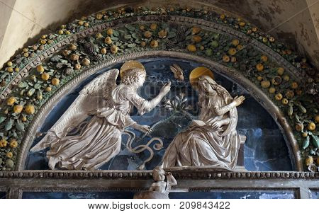 LUCCA, ITALY - JUNE 03: Lunette of The Annunciation, school Andrea della Robbia, Basilica of Saint Frediano, Lucca, Tuscany, Italy on June 03, 2017.