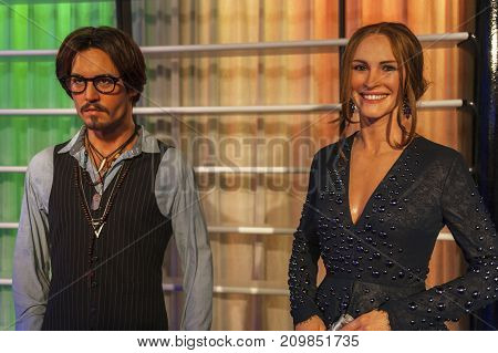 Berlin - March 2017: Johny Depp and Julia Roberts wax figures in Madame Tussauds museum