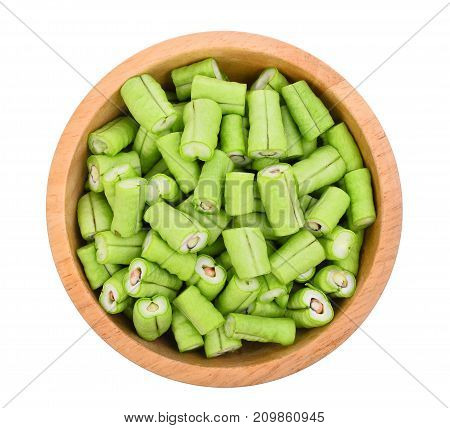 top view of slice yard long bean in wooden bowl isolated on white background
