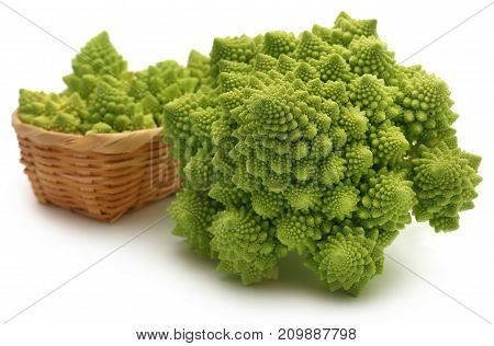 Closeup of Romanesco broccoli over white background