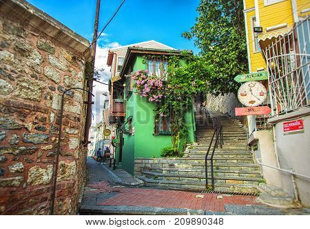 ISTANBUL TURKEY: Old street with stair and cute green house in Uskudar district on October 3 2017