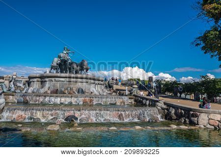 Copenhagen Denmark - september 3 2017: The Gefion Fountain is a large fountain on the harbour front in Copenhagen. It features a group of animal figures being driven by the Norse goddess Gefjon.