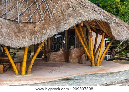 Bamboo house with a straw roof made by own hands. Life and interior items of the Gili Trawangan island, Indonesia.