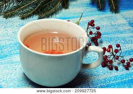 Hot tea viburnum. Tea viburnum in a glass cup.
