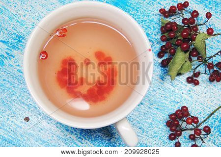 Hot tea viburnum. Tea viburnum in a glass cup.