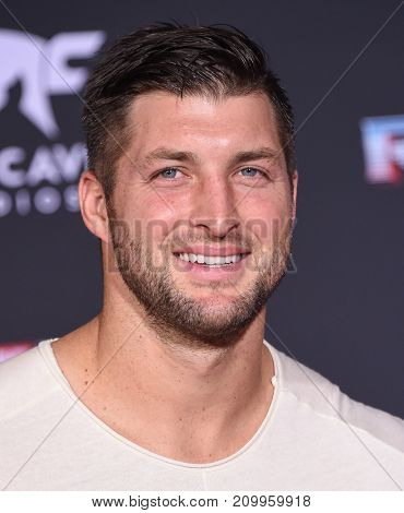 LOS ANGELES - OCT 10:  Tim Tebow arrives for the 