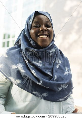 A cheerful Muslim woman
