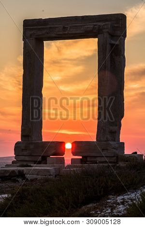 Sunset At The Portara In Naxos, Aegean In Greece