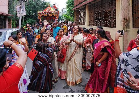 Howrah, West Bengal , India - July 22th 2018 : Bengali Hindu Sari Clad Devotee Ladies Dancing In Joy