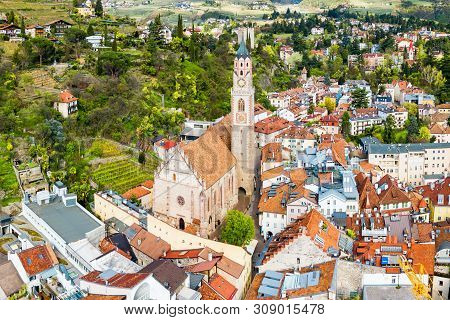 St. Nicholas Church Aerial Panoramic View In Merano. Merano Or Meran Is A Town In South Tyrol In Nor