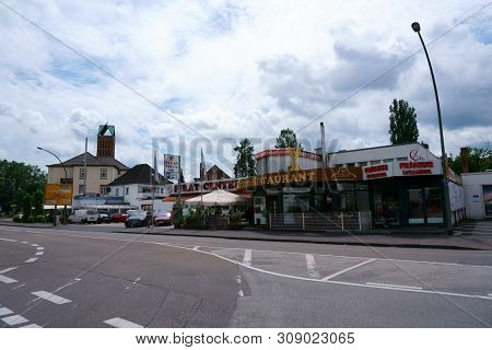 Hanau, Germany - June 16: Turkish Restaurant, Shops And A Barber Shop Near The Main Train Station On