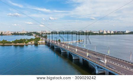 Aerial Hyperlapse Video With View Of Bridge, Cars Moving Fast On A Bridge On A Sunny Day