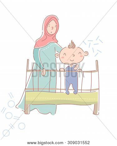 Cute Happy Little Baby Boy In A Crib Or Cot With His Young Mother In Hijab And Traditional Muslim Cl