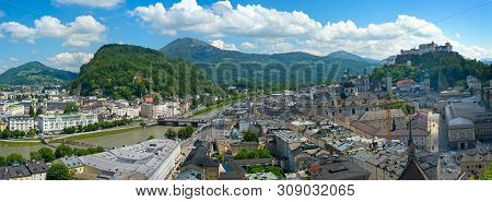Panorama Of Salzburg, Austria, Looking Over The Historic Old Town, With The Salzach River, The Hills