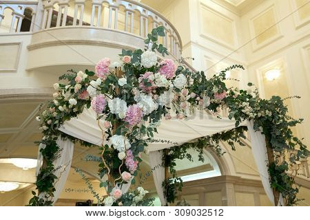 Beautiful Wedding Huppah Decorated With Fresh Fresh Flowers From Hydrangea And Eucalyptus Sheets In 