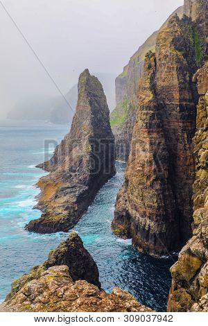 Dramatic Cliffs And Rock Formations Of Sorvagsvatn Faroe Islands