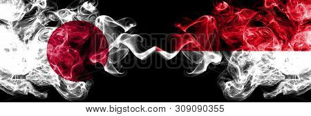 Japan Vs Monaco, Monacan Smoky Mystic Flags Placed Side By Side. Thick Colored Silky Smokes Combinat
