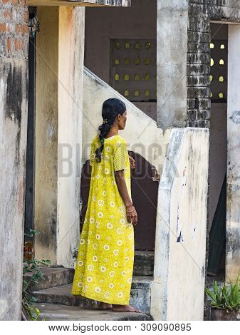 Puduchery, India - December Circa, 2018. Unidentified Young And Elegant Woman In Indian Yellow Sari 