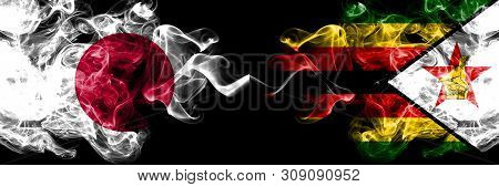 Japan Vs Zimbabwe, Zimbabwean Smoky Mystic Flags Placed Side By Side. Thick Colored Silky Smokes Com