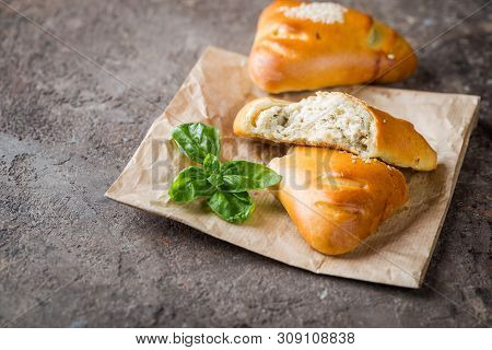 Homemade Chicken And Mushroom Mini Pies On Paper