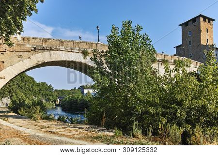 Rome, Italy - June 22, 2017: Amazing View Of Tiber River And Pons Fabricius In City Of Rome, Italy