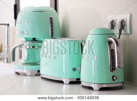 Torrevieja, Spain - June1, 2019: On Kitchen Counter Top Closeup In Row Smeg Brand Kitchen Appliances