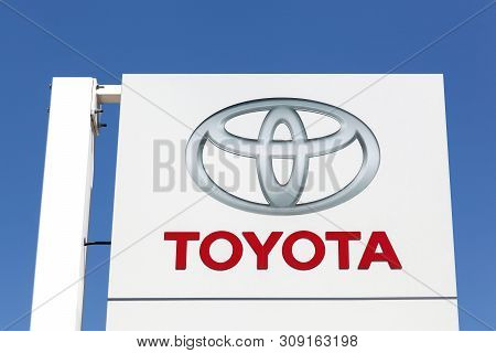 Decines, France - June 13, 2019: Toyota Logo On A Panel. Toyota Motor Corporation Is A Japanese Auto