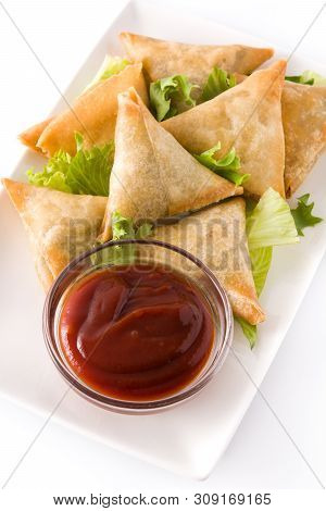 Samsa Or Samosas With Meat And Vegetables Isolated On White Background . Traditional Indian Food. Cl