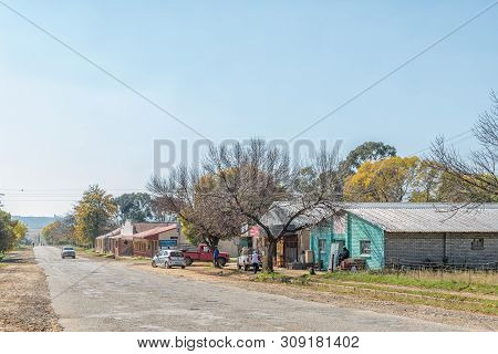 Paul Roux, South Africa, May 1, 2019: A Street Scene, With Businesses And Houses, In Paul Roux, A Sm