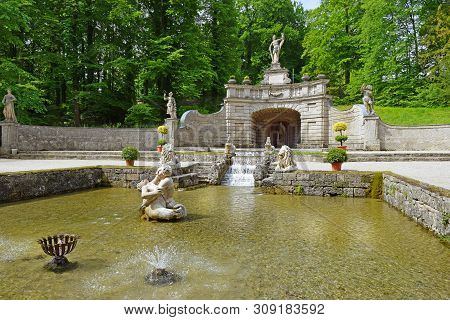 Salzburg, Austria - May 25, 2019 : Trick Fountains And Sculptures At The  Public Gardens Of Hellbrun