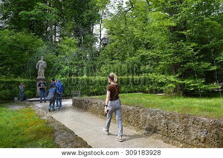 Salzburg, Austria - May 25, 2019 : Trick Fountains And Sculptures At The  Public Gardens Of Hellbrun