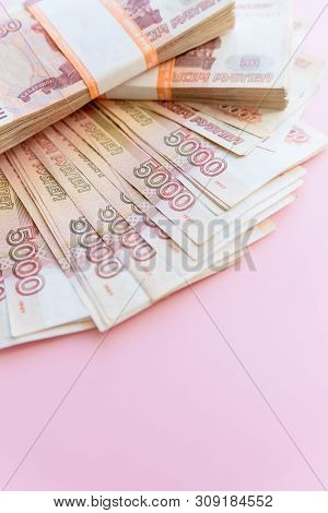Russian Rubles Isolated On Pink, Packed Stack Of Banknotes.russian Money 5000 Rubles Banknote Closeu