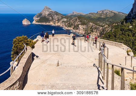 Mallorca, Spain - May 6, 2019: Tourists Visit Mirador Es Colomer - The Main Viewpoint At Cap De Form