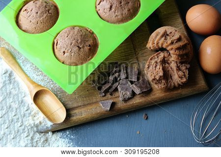 Homemade Muffins With Chocolate. Ingredients For Baking. Copy Space.