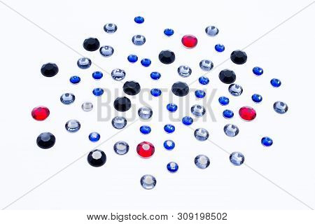 Multi-colored Rhinestones Isolated On White Background. Close Up.