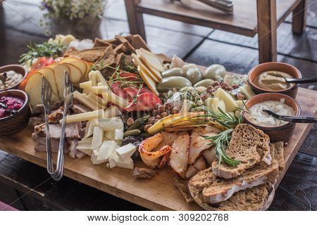 Assorted Ham, Sausage, Mozzarella, Grapefruit, Grapefruit, Date, Basil, Cucumber, Vegetable Grill On