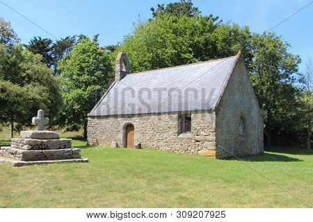 Outdoor Of Saint Gonvel Chapel And Cross In Landunvez